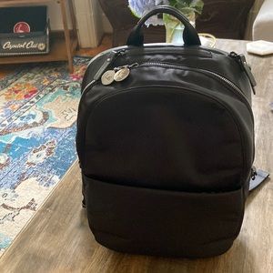 Lo & Sons - The Beacon backpack in black/gunmetal zipper/azure blue interior